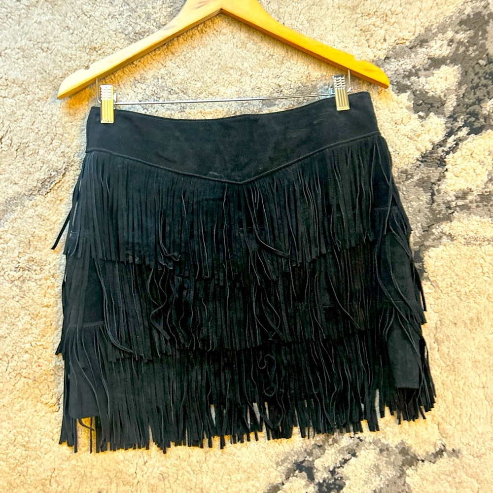 Black suede tassel mini skirt says xs but I would say fits a us 6
